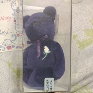 Charming Purple and White Stuffed Bear